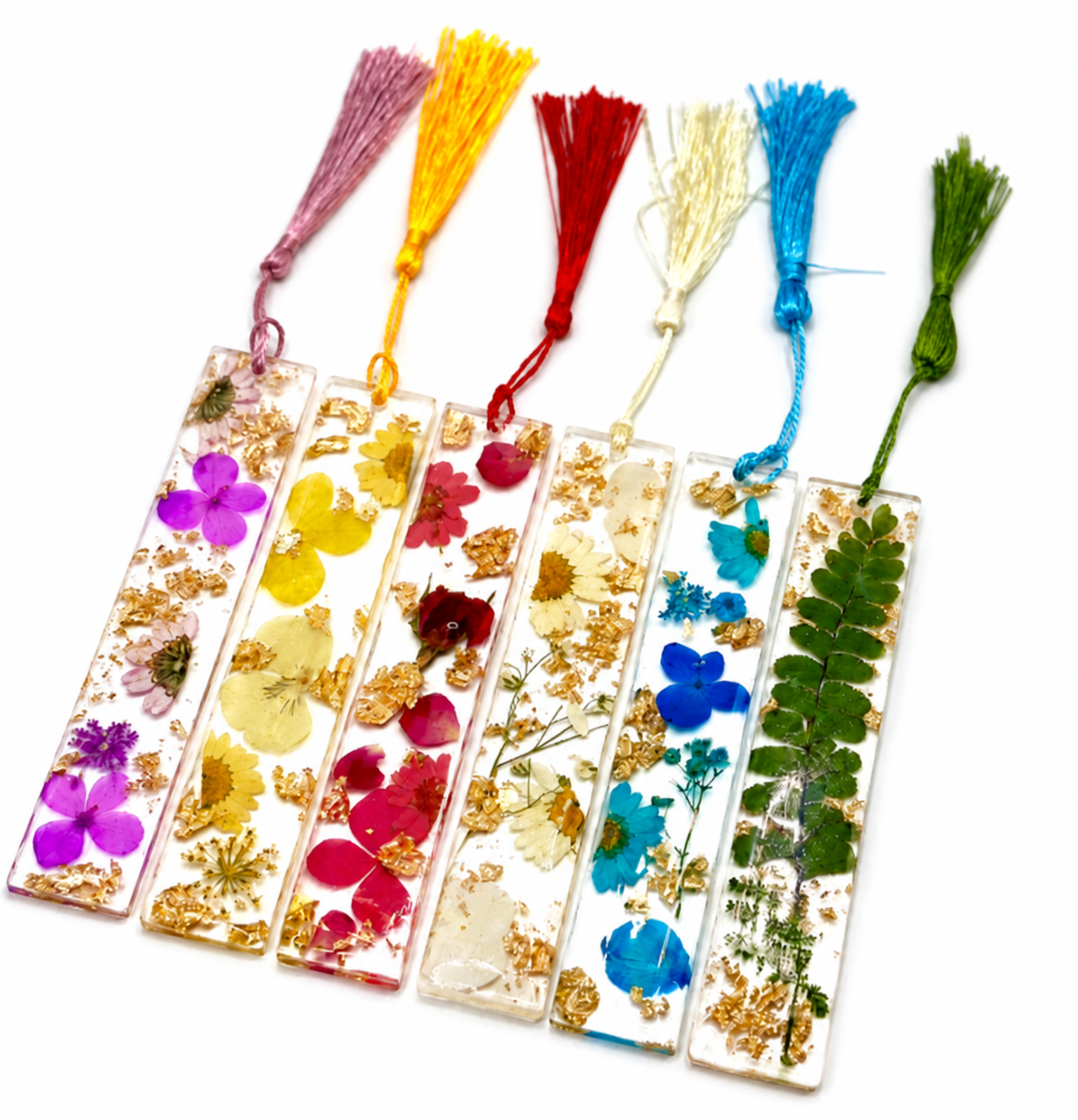 Six clear floral resin bookmarks with colourful tassels and gold flakes