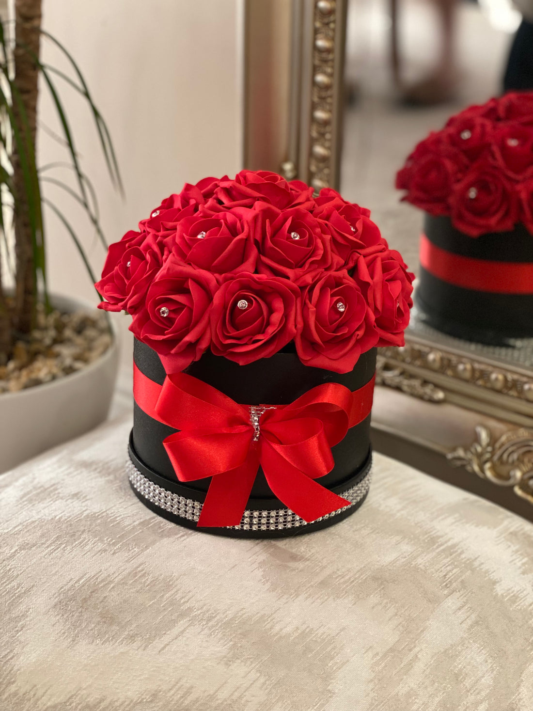 Black Hat Box with Red Roses